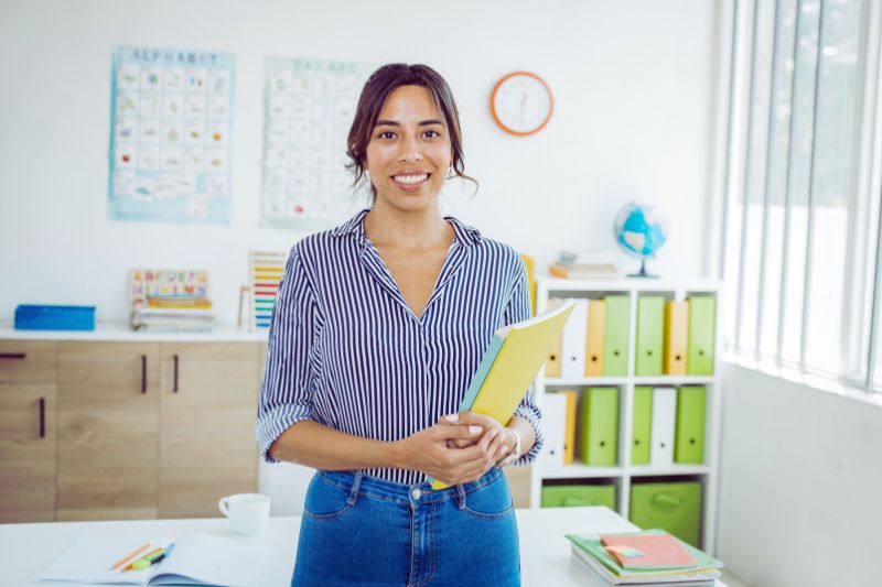 a teacher standing in a classroom
